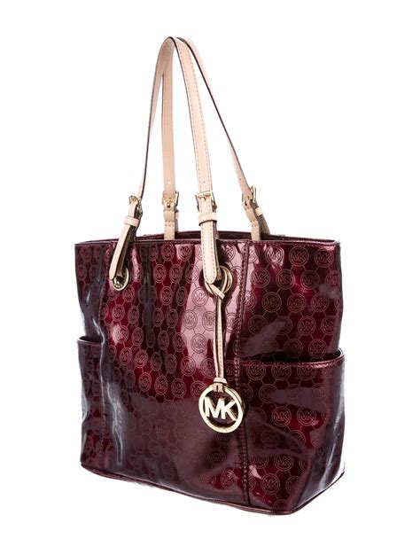 are all michael kors bags real leather|michael kors patent leather bag.